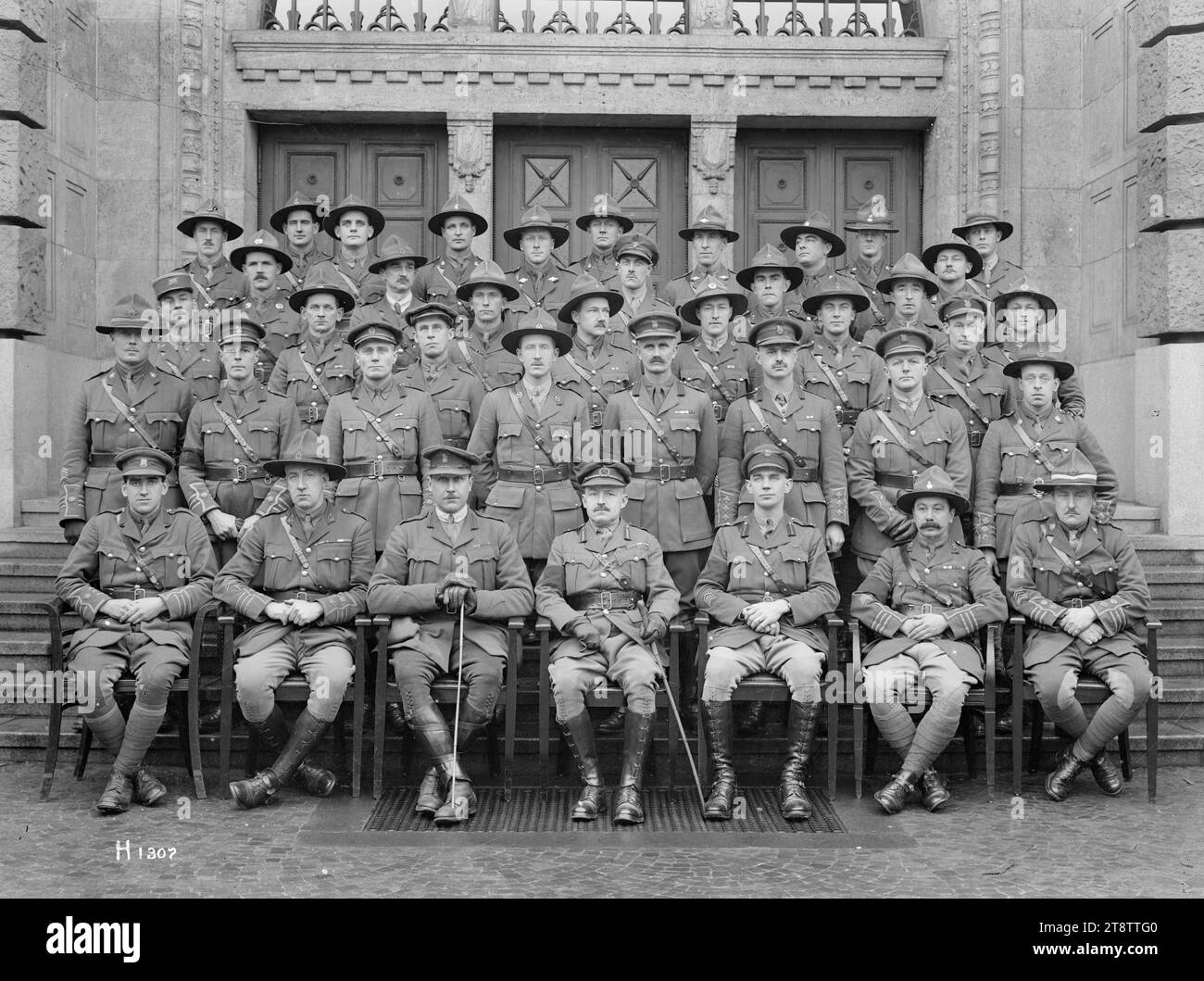 Major General Russell and staff officers at Divisional Headquarters, Leverkusen, Germany, Group portrait of Major General Andrew Russell (seated centre) with staff officers at New Zealand Divisional Headquarters in Leverkusen during the occupation of Germany after World War I. Present also is Lieutenant Colonel Henry Maitland (Jumbo) Wilson, General Staff Officer 1, sitting on the left of Russell. Photograph taken March 1919 Stock Photo