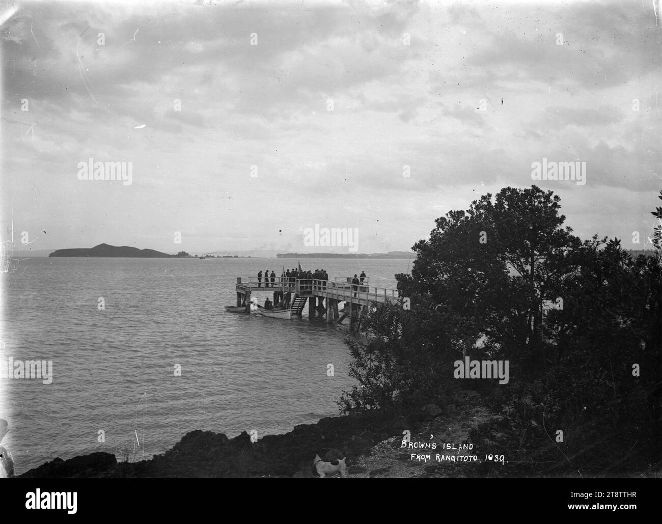 Browns Island viewed from Rangitoto Island, View of the wharf and