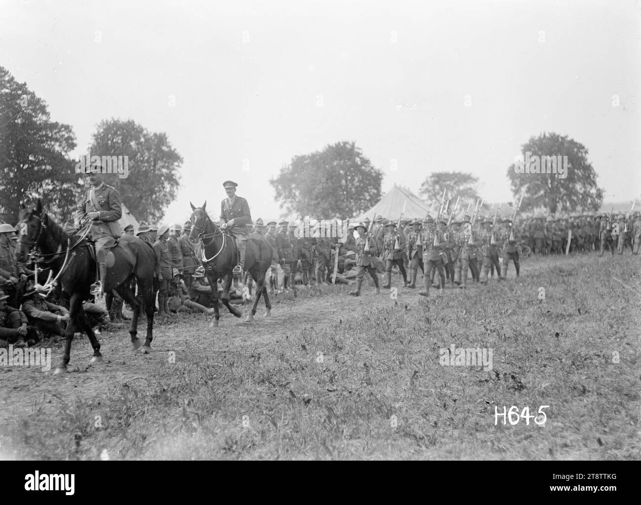The march past of winners at a New Zealand Infantry Brigade competition, France, First prize winners marching past at a recreational event organised by a New Zealand Infantry Brigade during World War I. Activities included a horse show and guard mounting. Photograph taken Vaucelles 1 June 1918 Stock Photo