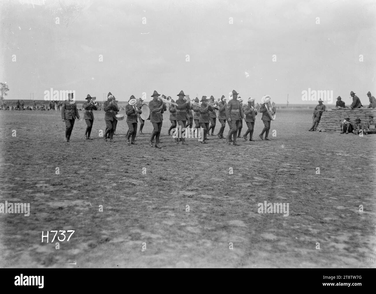 Judging at the New Zealand Divisional band contest, France, An RSM of the Grenadier Guards judges the marching of a brass band at the New Zealand Divisional band contest in Authie, France, during World War I. Photograph taken 27 July 1918 Stock Photo