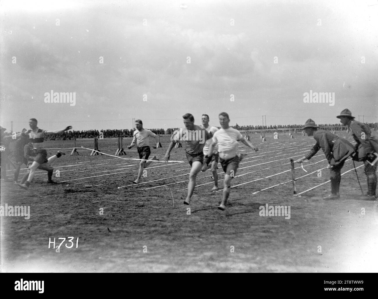 The finish of the 100 yards race, Authie, France, Soldiers reaching the finishing line in the hundred yards race at the New Zealand Divisional sports in Authie during World War I. Photograph taken 27 July 1918 Stock Photo