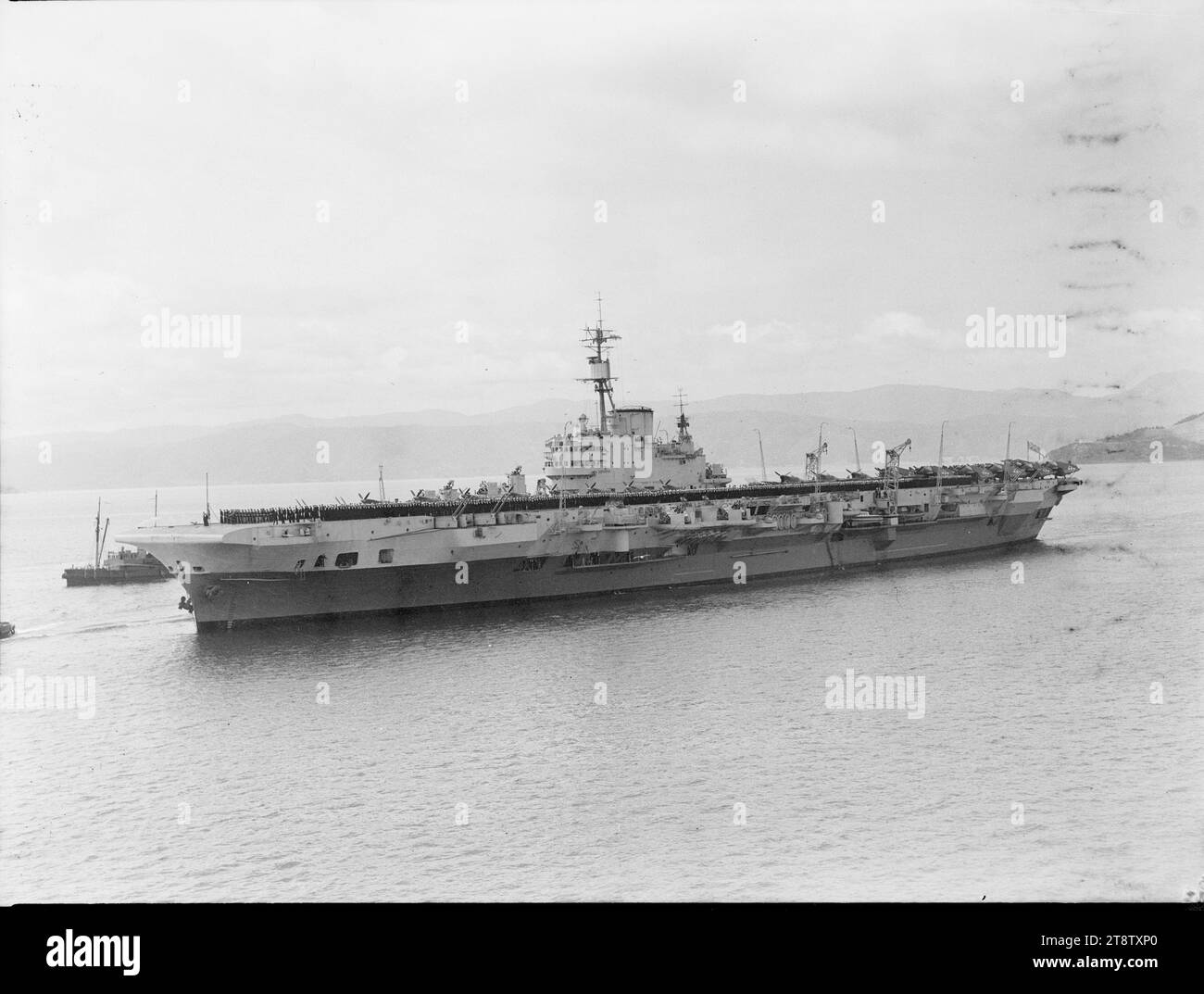 British aircraft carrier Indefatigable, Wellington, New Zealand Harbour, November 1945 Stock Photo