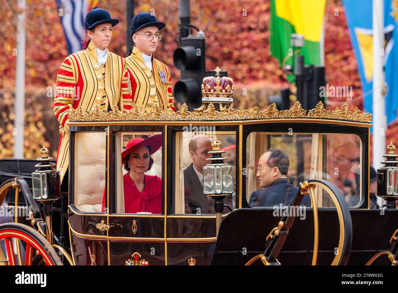 The Mall, London, UK. 21st November 2023. Their Royal Highnesses, The Prince and Princess of Wales, along with South Korean Deputy Prime Minister, Choo Kyung-ho, ride in a carriage procession along The Mall following a formal welcome of The President of the Republic of Korea, His Excellency Yoon Suk Yeol, and the First Lady, Mrs Kim Keon Hee, by Their Majesty's King Charles III and Queen Camilla on Horse Guards Parade on the first full day of the South Korean State Visit to the UK. Photo by Amanda Rose/Alamy Live News Stock Photo