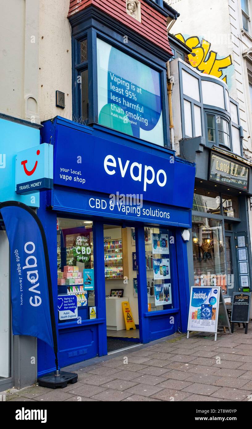 The Evapo shop in North Street Brighton specialising in CBD and Vaping solutions with a sign above claiming vaping is 95 percent less harmful than smoking Stock Photo