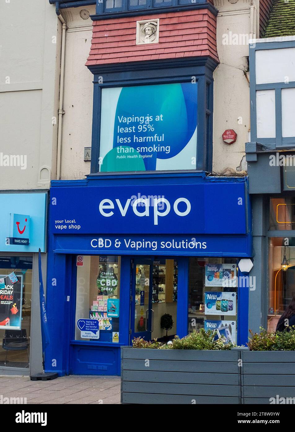 The Evapo shop in North Street Brighton specialising in CBD and Vaping  solutions with a sign above claiming vaping is 95 percent less harmful than  smoking Stock Photo - Alamy