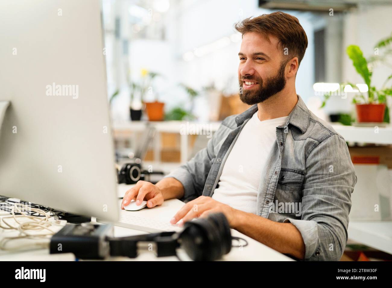 Male computer programmer working at office Stock Photo