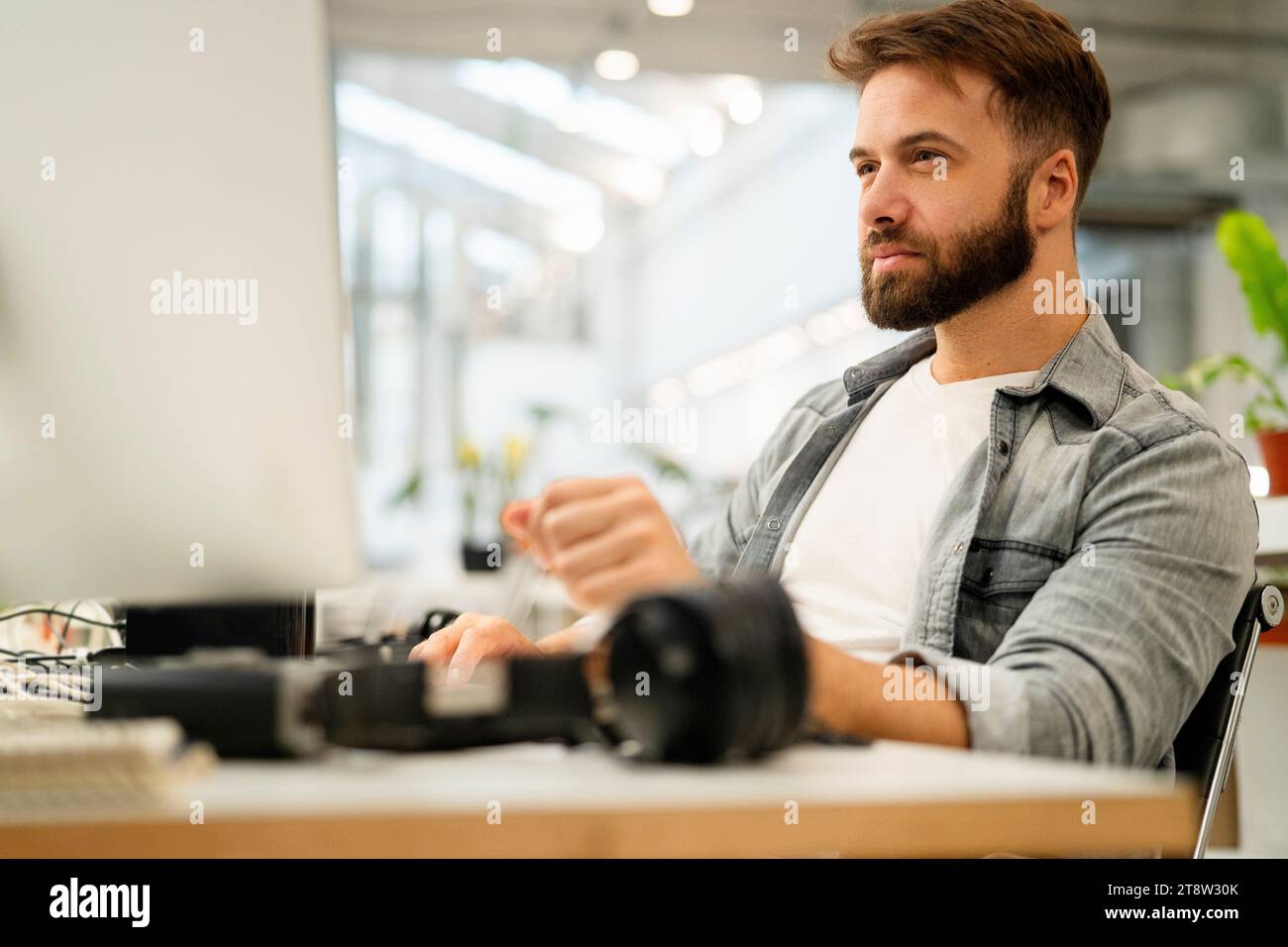 Male computer programmer working at office Stock Photo