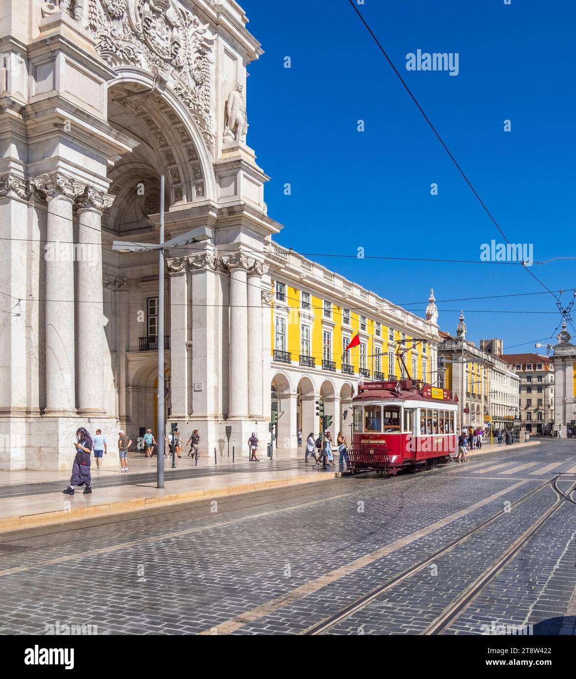 Lisbon tram or trolley on Rue Da Alfandega on the Praça do Comércio or Commerce Square  in the  Baixa section of Lisbon Portugal Stock Photo