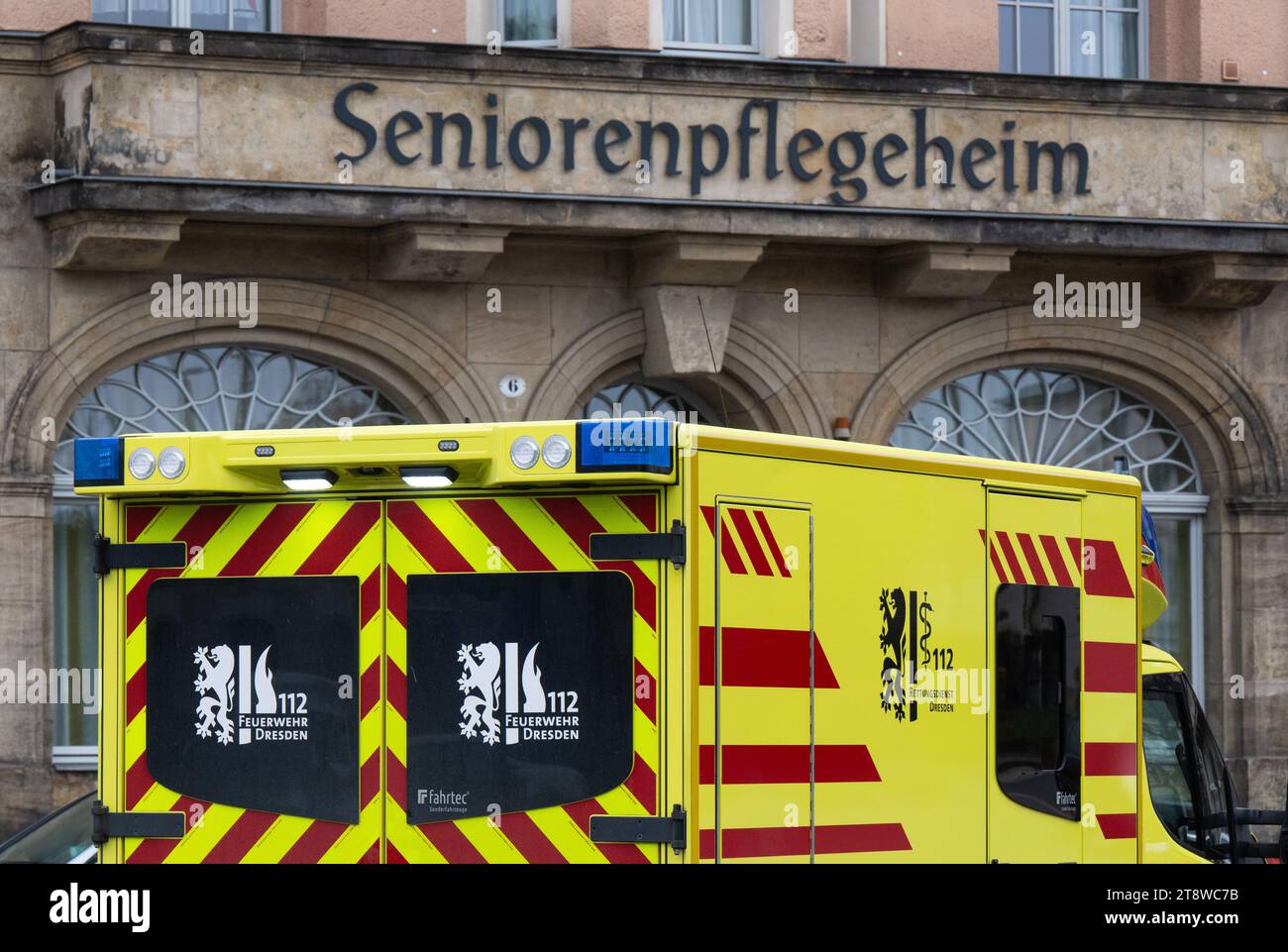 Dresden, Germany. 21st Nov, 2023. An ambulance from the Dresden fire department is parked in front of a nursing home for the elderly at Neustadt station. Credit: Robert Michael/dpa/Alamy Live News Stock Photo