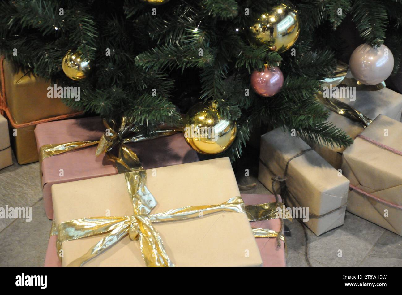 Copenhagen, Denmark /21 November 2023/ Various shopping malls have decorated christmas tree snd shwcase with various christmas presents inspiration with chistmas presents unders trees and merry christmnas signs in mall in capital. Photo.Francis Joseph Dean/Dean Pictures Stock Photo