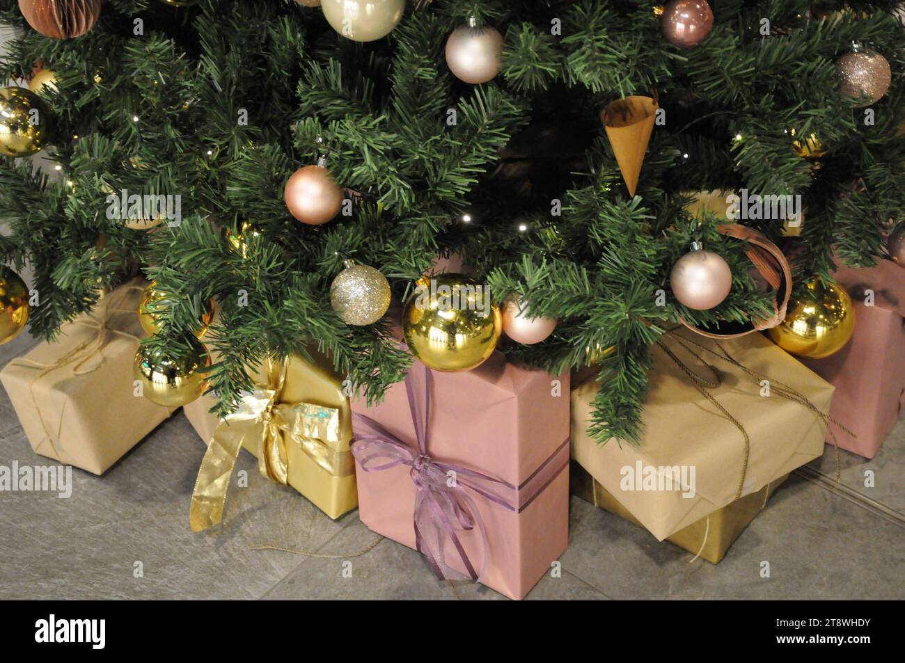 Copenhagen, Denmark /21 November 2023/ Various shopping malls have decorated christmas tree snd shwcase with various christmas presents inspiration with chistmas presents unders trees and merry christmnas signs in mall in capital. Photo.Francis Joseph Dean/Dean Pictures Stock Photo