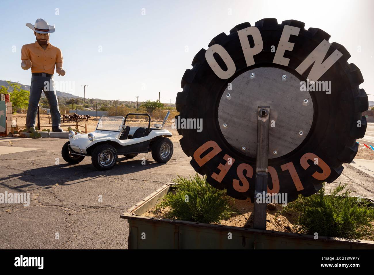 Twentynine Palms, California May 13, 2023 Repair Shop with a giant Cowboy in Mojave Desert