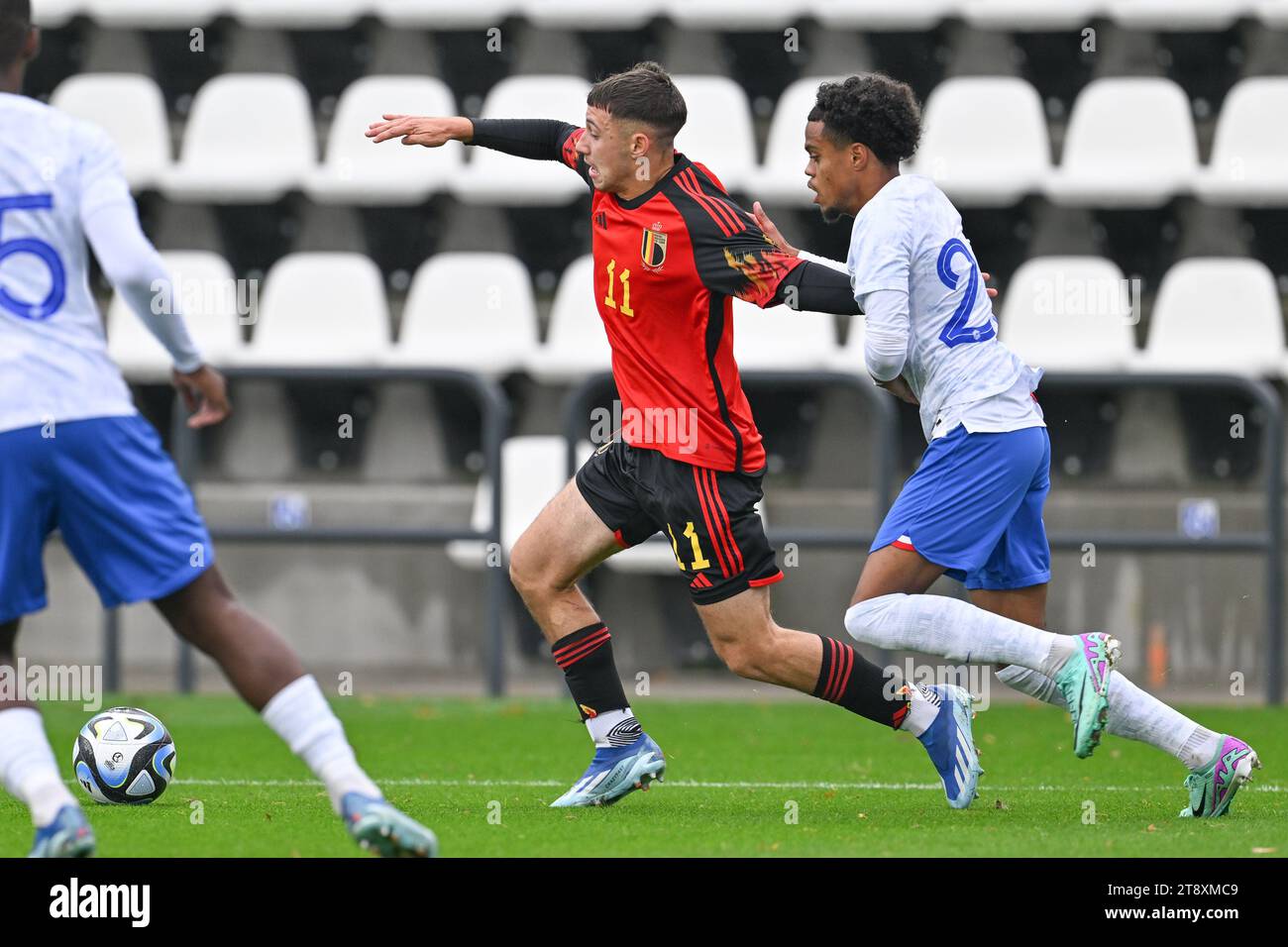 Tubize, Belgium. 21st Nov, 2023. Cedric Nuozzi (11) of Belgium and Therence KOUDOU (20) of France pictured during a friendly soccer game between the national under 20 teams of Belgium and France on Tuesday 21 November 2023 in Tubize, Belgium . Credit: sportpix/Alamy Live News Stock Photo