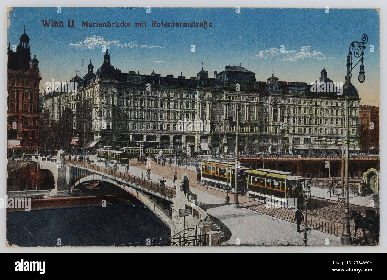 Danube Canal - Marienbrücke, view towards Rotenturmstraße, picture postcard, Unknown, 1919, coated paperboard, autochrome print, Inscription, FROM, Vienna, TO, Graz, ADDRESS, Dear, Fräulein, Buchhalterin, Graz, Stubenberggasse 6, MESSAGE, To show you how beautiful our dear Vienna city is, I send you this card. I am your sincere friend and [signature], 22., X.19., Danube, Public Transport, Media and Communication, Donaukanal, traffic and transport, Postcards with transliteration, street, the usual house or row of houses, flat-building, apartment house, house combined with store Stock Photo