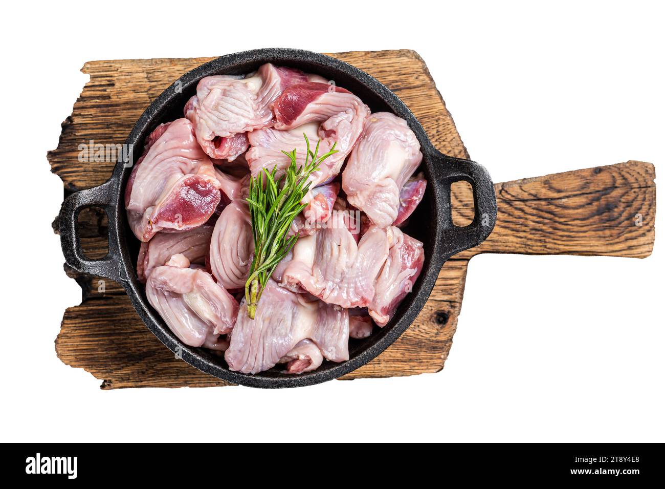 Raw chicken giblets gizzards, stomachs in a skillet ready for cooking