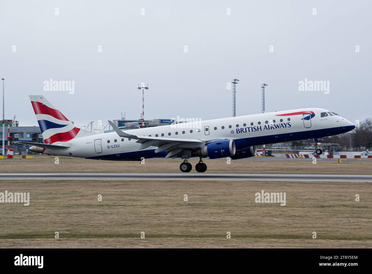 British Airlines regional airliner Embraer E195 landing in Prague after a flight from London Stock Photo