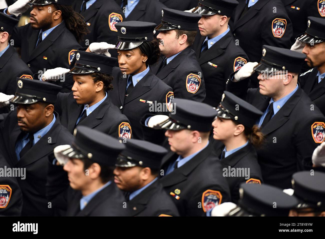 New York, USA. 21st Nov, 2023. Some of the 80 FDNY Paramedics salute