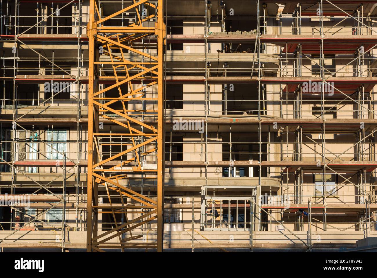 Scaffolding on a new building in shell construction Stock Photo - Alamy