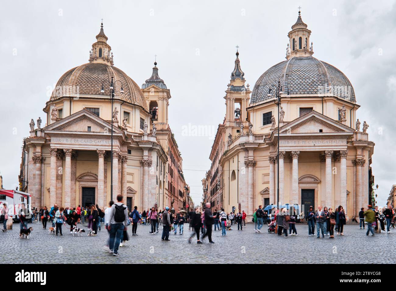 Rome, Italy - November 3 2023: Scenic view of the twin churches churches of Santa Maria Montesanto and Santa Maria Miracoli in Piazza del Popolo, icon Stock Photo