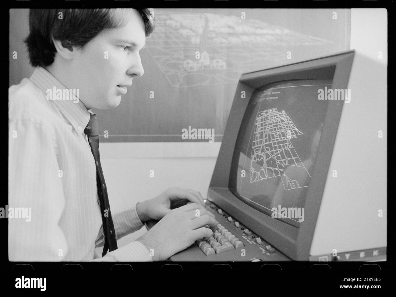 Man seated at computer using 3-D architectural design system, Washington, District of Columbia, 2/9/1982. (Photo by Marion S Trikosko/US News and World Report Magazine Collection Stock Photo