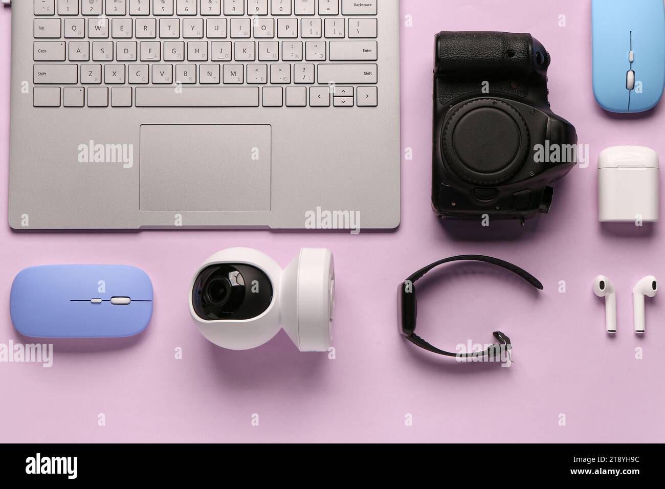 Modern gadgets on lilac background Stock Photo