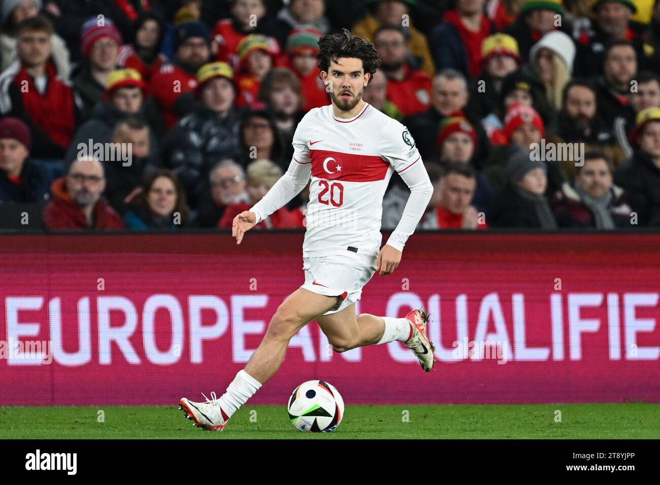 Ferdi Kadıoğlu of Turkey breaks with the ball during the UEFA Euro Group D Qualifier match Wales vs Turkey at Cardiff City Stadium, Cardiff, United Kingdom, 21st November 2023  (Photo by Craig Thomas/News Images) Stock Photo