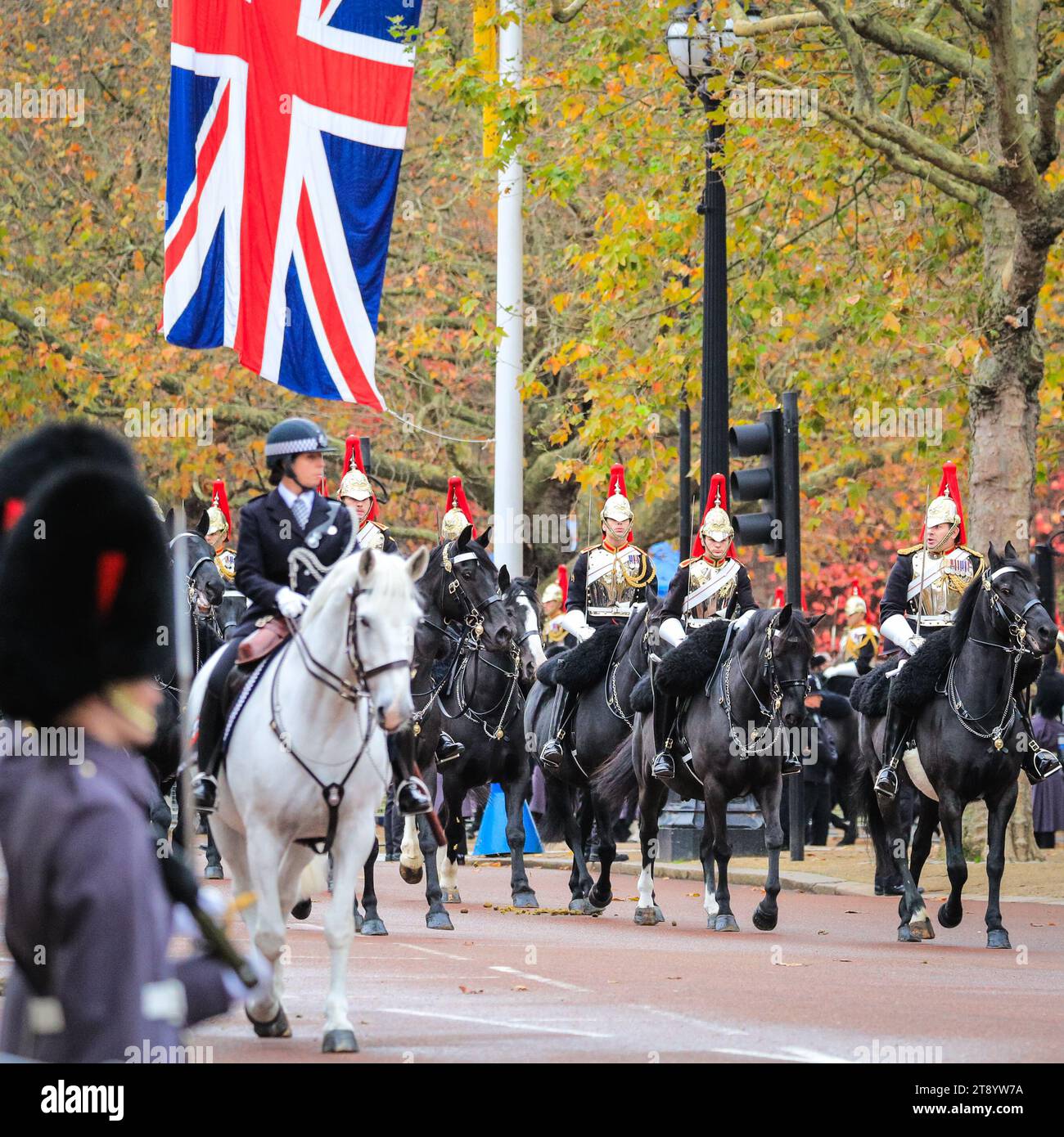 London, UK. 21st Nov, 2023. Mounted soldiers of the Household Cavalry. Troops proceed along the Mall, accompanying the carriages carrying members of the British Royal family and the state visitors from South Korea. The President of the Republic of Korea, His Excellency Yoon Suk Yeol, accompanied by Mrs Kim Keon Hee, pays a State Visit to the UK as the guest of their Majesties the King and Queen. Credit: Imageplotter/Alamy Live News Stock Photo