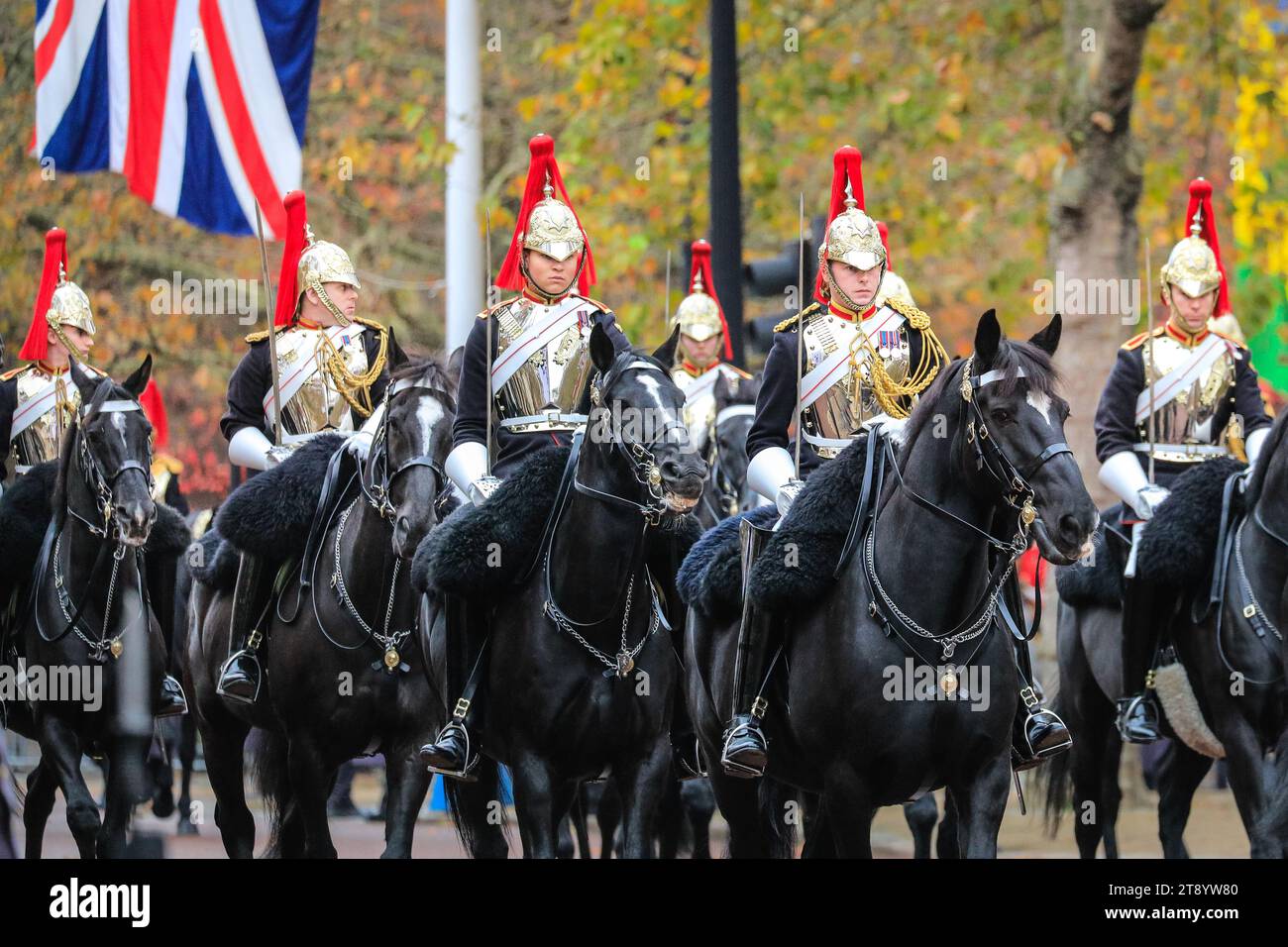 London, UK. 21st Nov, 2023. Mounted soldiers of the Household Cavalry. Troops proceed along the Mall, accompanying the carriages carrying members of the British Royal family and the state visitors from South Korea. The President of the Republic of Korea, His Excellency Yoon Suk Yeol, accompanied by Mrs Kim Keon Hee, pays a State Visit to the UK as the guest of their Majesties the King and Queen. Credit: Imageplotter/Alamy Live News Stock Photo