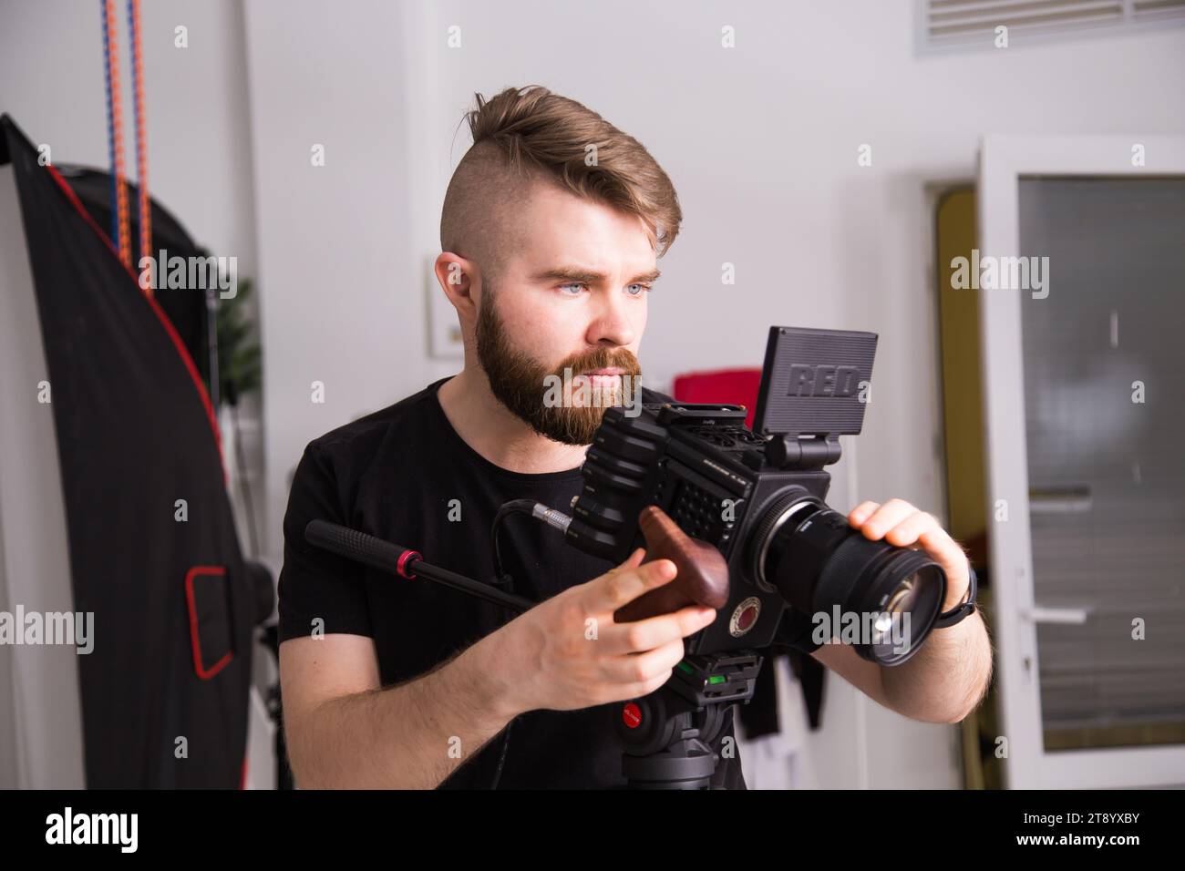 UFA, RUSSIA - 29 FEBRUARY 2020: cameraman works with Red digital cinema cameras. RED is the leading manufacturer of professional digital cinema Stock Photo
