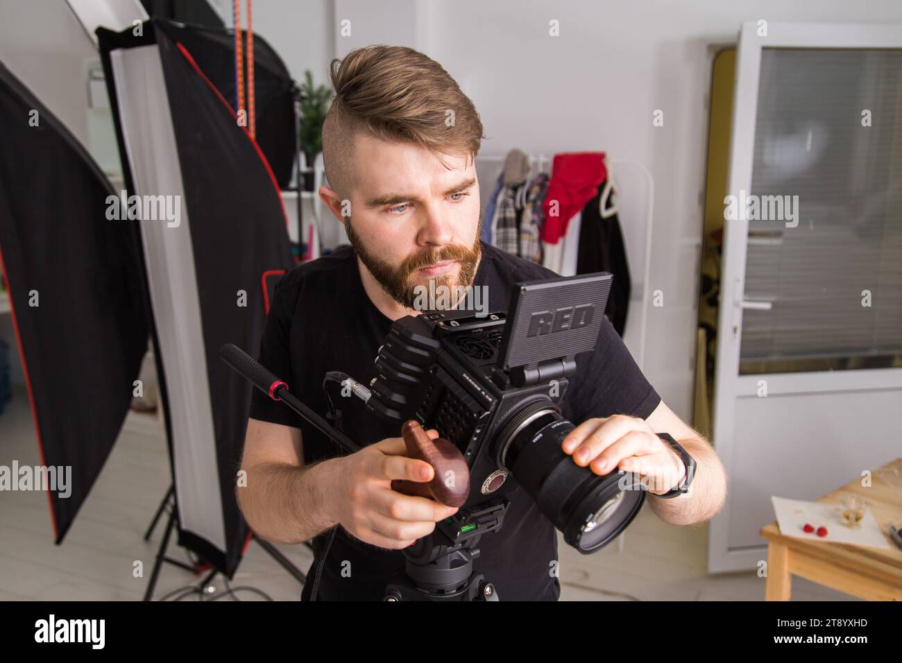 UFA, RUSSIA - 29 FEBRUARY 2020: cameraman works with Red digital cinema cameras. RED is the leading manufacturer of professional digital cinema Stock Photo