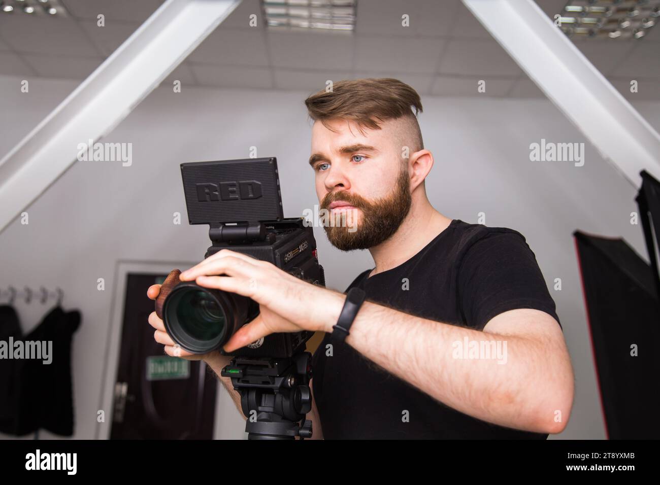 UFA, RUSSIA - 29 FEBRUARY 2020: cameraman works with Red digital cinema cameras. RED is the leading manufacturer of professional digital cinema Stock Photo