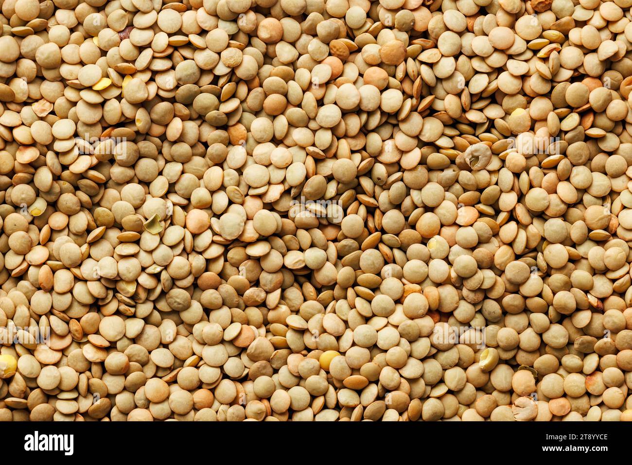 The uncooked lentil legumes. Top view Stock Photo Alamy