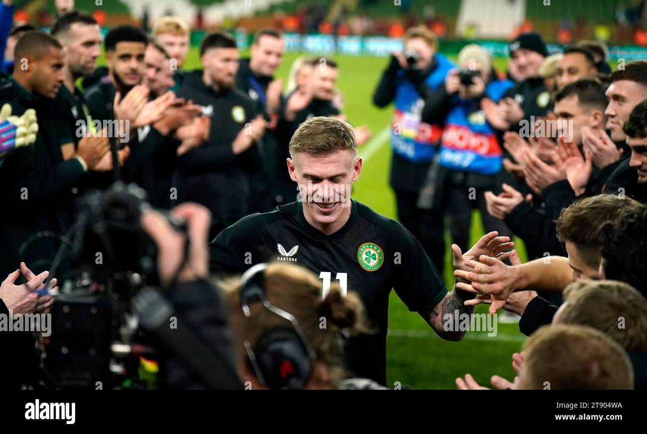 Republic of Ireland's James McClean is given an guard of honour by team-mates and staff after the final whistle in an International Friendly match at the Aviva Stadium, Dublin. Picture date: Tuesday November 21, 2023. Stock Photo