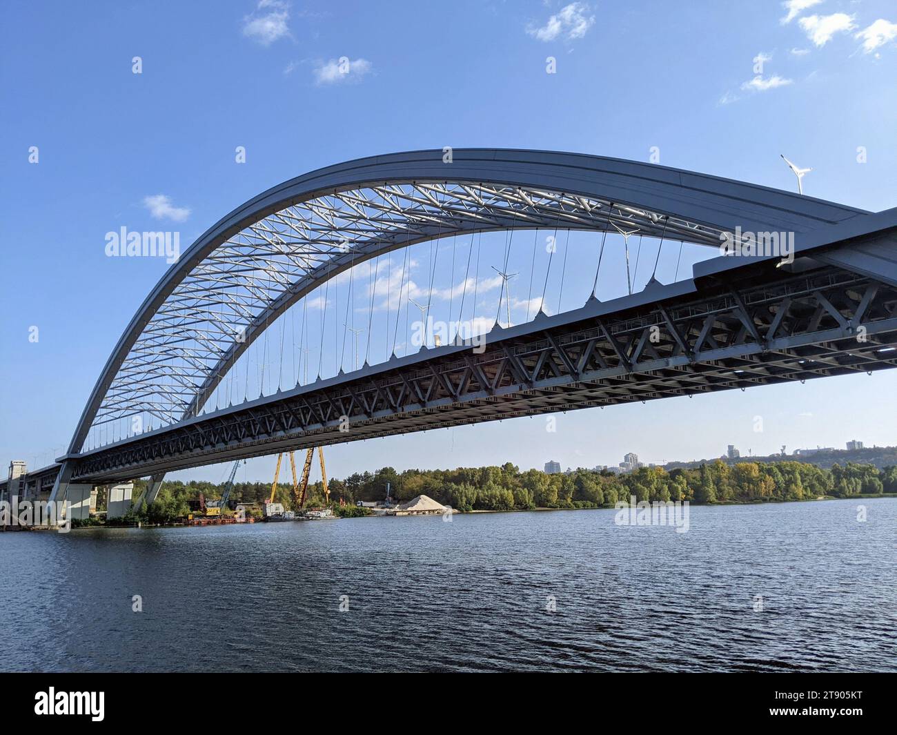 The Podilsky Bridge is a combined road-rail bridge over the Dnipro River under construction in Kyiv, Ukraine Stock Photo