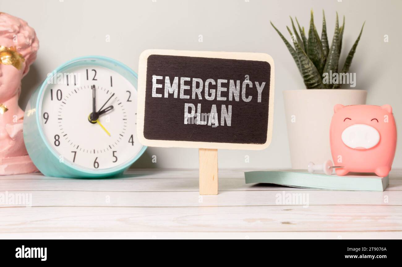 Emergency Plan text quote on notepad, concept background. Stock Photo