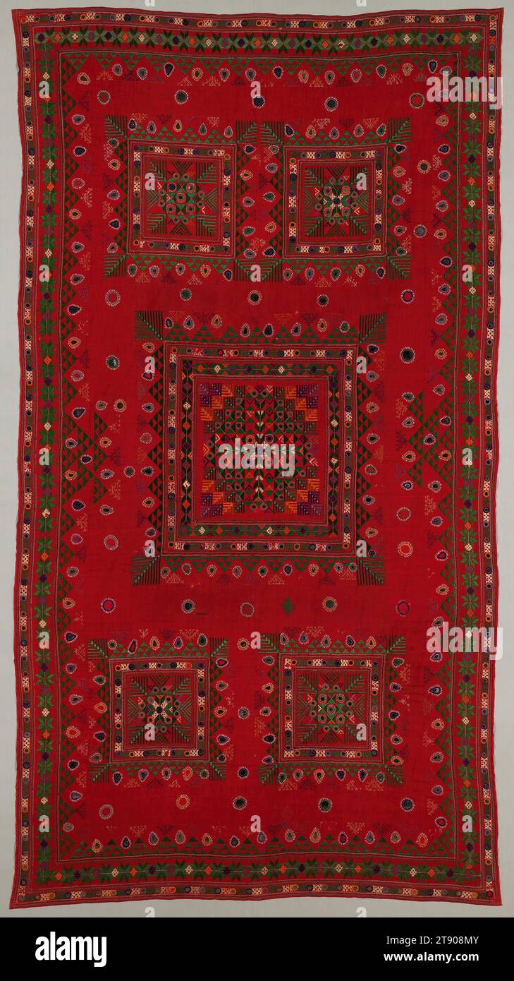 Woman's wedding veil (odhani), second quarter 20th century, 95 5/8 x 47 in. (242.89 x 119.38 cm) (irregular), Cotton, silk, glass; embroidery, Pakistan, 20th century, The Thar Desert is a vast arid region sprawling across Sindh, Pakistan into the Indian states of Rajasthan and Gujarat. Here, red is the traditional color of weddings, peacocks stand for bride grooms, and flowers are symbols of fertility and prosperity Stock Photo