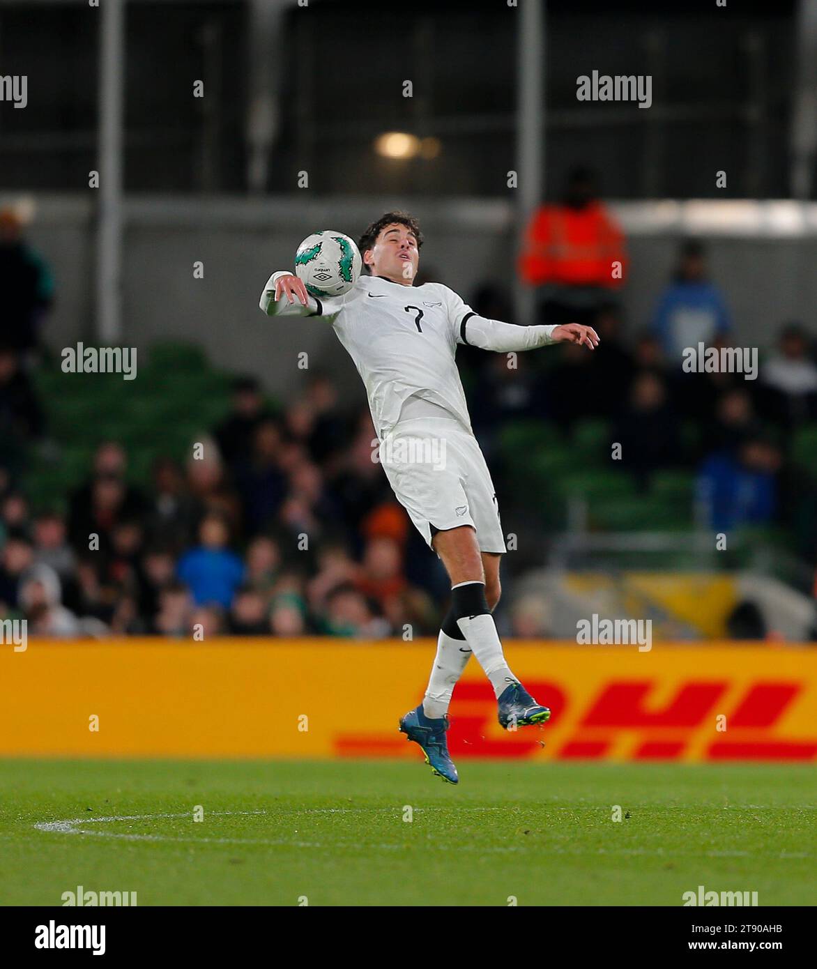 Aviva Stadium, Dublin, Ireland. 21st Nov, 2023. International Football Friendly, Republic of Ireland versus New Zealand; Matthew Garbett of New Zealand controls the ball with his arm mid-field Credit: Action Plus Sports/Alamy Live News Stock Photo