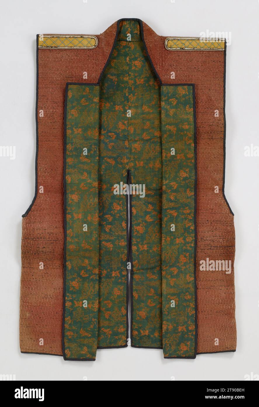 Campaign vest (jinbaori), 19th century, Unknown Japanese, 37 1/2 x 24 1/2 in. (95.25 x 62.23 cm), Paper, wool, silk, metallic thread, Japan, 19th century, In earlier times, samurai wore jackets and trouser suits made from richly colored and patterned silk, beneath relatively little armor. But in the 16th century the style of armor changed to cover more of the body, and these elaborate undergarments were concealed. As a result, high-ranking lords began to wear surcoats over their armor. These garments were often made of luxurious, sometimes imported materials. Flamboyant designs Stock Photo