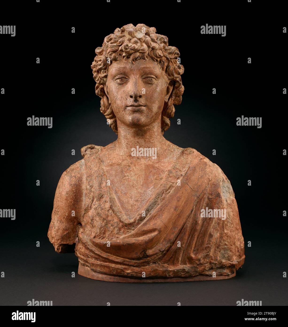 Saint John the Baptist, c. 1505, Benedetto da Rovezzano, Italian, c. 1474–1552, 19 11/16 x 16 1/4 x 8 3/4 in. (50 x 41.28 x 22.23 cm), Terra cotta, Italy, 16th century, During the Renaissance, busts of Saint John the Baptist as a boy were commonly displayed in Florentine homes. Saint John’s fine and innocent face and curly hair embody the ideal of youthful beauty at that time. Benedetto da Rovezzano made this bust in Florence when Leonardo da Vinci, Raphael, and Michelangelo were leading the artistic scene in town. When Michelangelo left for Rome in 1508 to paint the Sistine Chapel ceiling Stock Photo