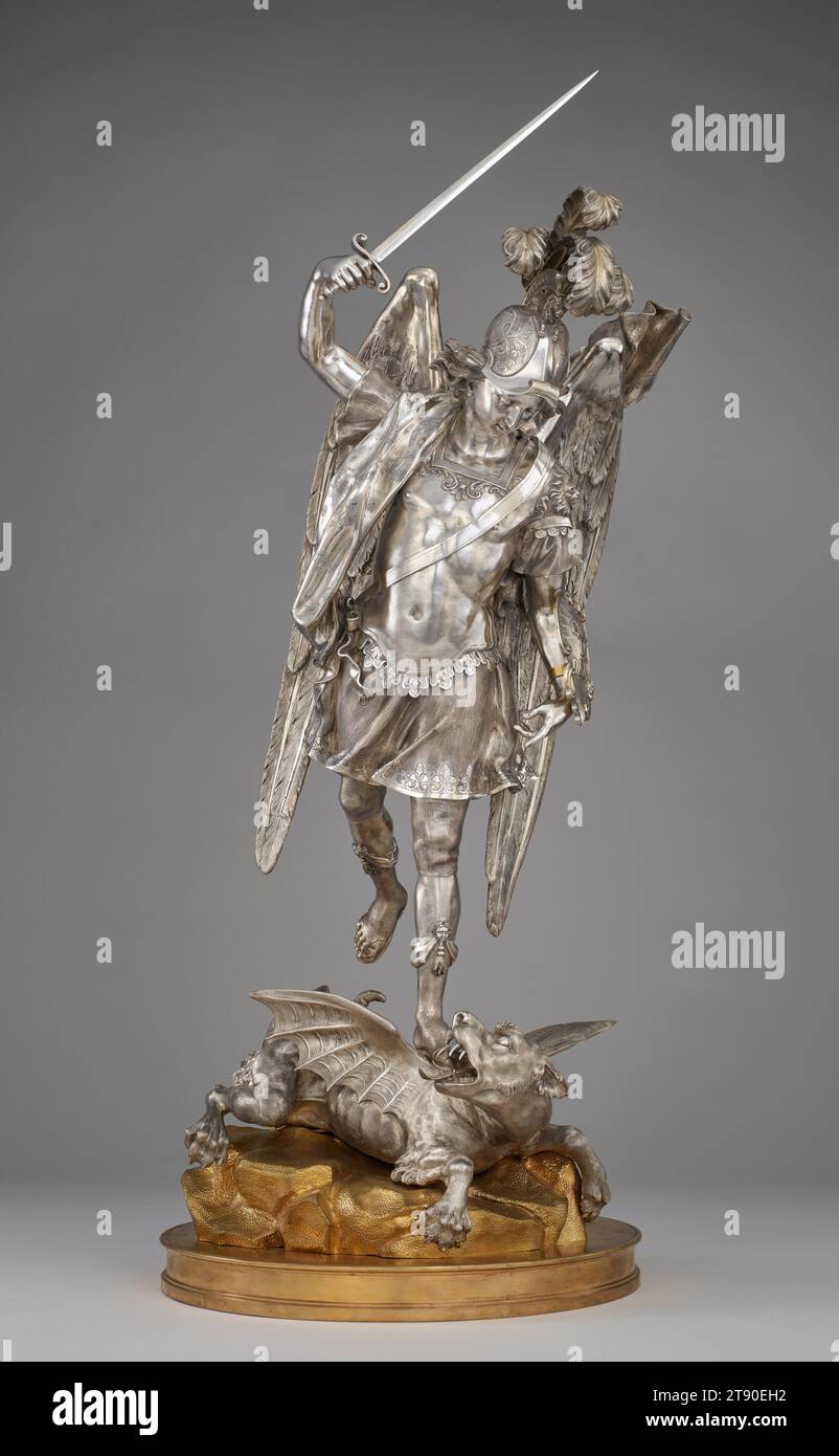 The Archangel Saint Michael in Triumph, c. 1780, Giuseppe Sanmartino, Italian, 1720–1793, 33 1/2 × 13 7/8 × 13 5/16 in. (85.09 × 35.24 × 33.81 cm), Silver, gilt bronze, Italy, 18th century, The image of Saint Michael killing a dragon comes from the description of an epic battle between good and evil found in Revelation, the last book of the Christian Bible: 'And war broke out in heaven; Michael and his angels fought against the dragon. . . . The great dragon was thrown down, that ancient serpent, who is called the Devil and Satan.' The inscription Quis ut deus (Who is like God') on the shield Stock Photo