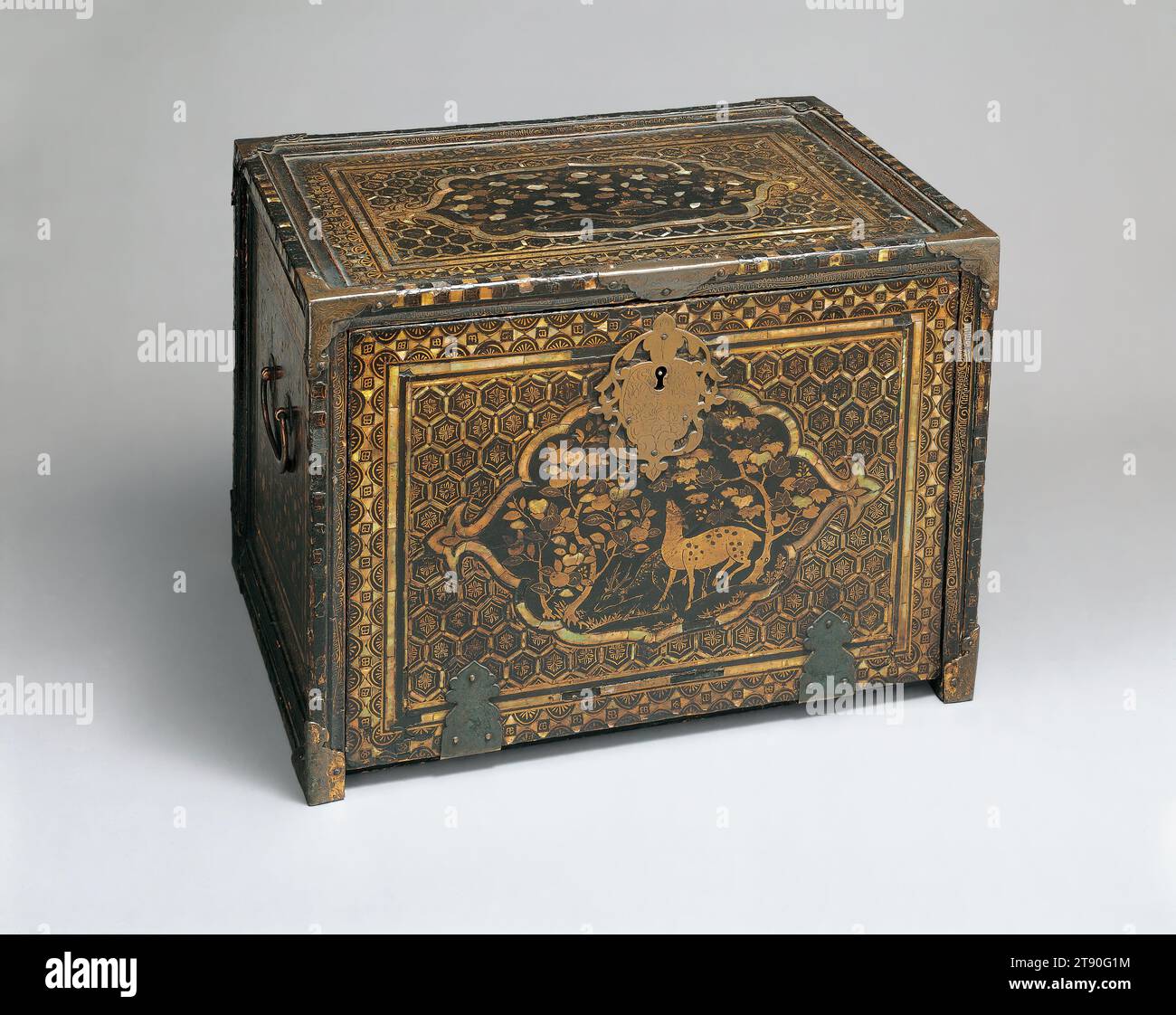 Portable desk, early 17th century, Unknown Japanese, 12 3/8 × 17 1/8 × 12 1/8 in. (31.43 × 43.5 × 30.8 cm), Black lacquer with gold and silver maki-e and mother-of-pearl inlay; metal fittings, Japan, 17th century, European merchants and missionaries in Japan discovered the beauty of lacquer in 1543 and began commissioning artists to create furnishings for European homes and churches soon thereafter. By 1610, an import company was established in Amsterdam to meet demand. This portable desk has a drop front and small drawers inside for storing writing supplies, making it a bargueño Stock Photo