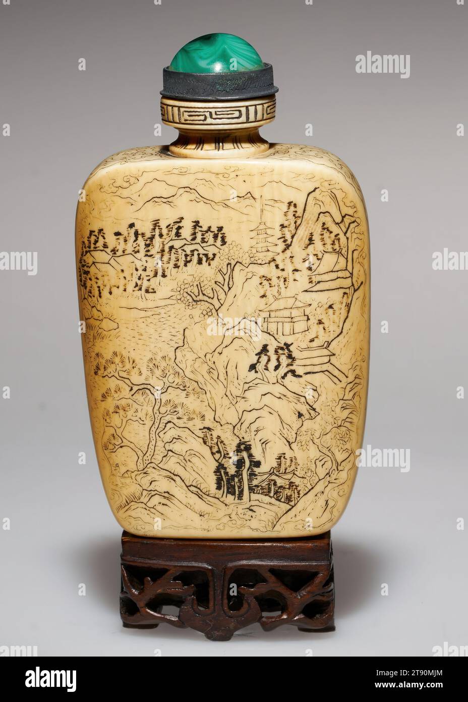 Snuff Bottle, 1875-1925, 3 1/2 x 2in. (8.9 x 5.1cm), Ivory, glass, silver, China, Carved from ivory, this bottle was then etched with a rocky, mountainous scene scattered with trees and tiny temples. A river flows in the background. The artist seems to have mimicked the spontaneous style of ink landscapes, using brushstroke-like lines to render the leaves on the trees and the outlines of the mountains Stock Photo