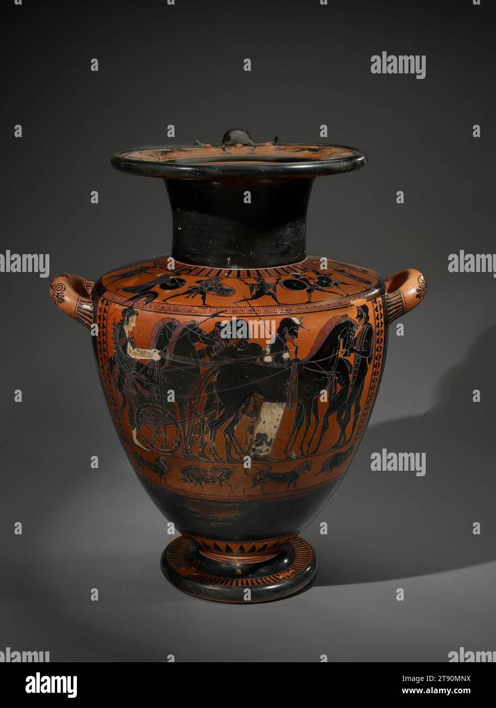 Black-figured Hydria, c. 530 BCE, Attributed to the Antimenes Painter, Greek, (Attica), 20 3/4 x 17 x 15 in. (52.71 x 43.18 x 38.1 cm), Slip-glazed earthenware, Greece, 6th–5th century BCE, The Antimenes Painter decorated many hydriae--three-handled water jars--of the sort seen here. In the main scene the goddess Athena, painted white to indicate her gender, helps harness her four-horse chariot, assisted by several grooms and the bearded charioteer. This harnessing technique accurately reflects sixth-century b.c. practices. The appearance of Athena dressed for war Stock Photo