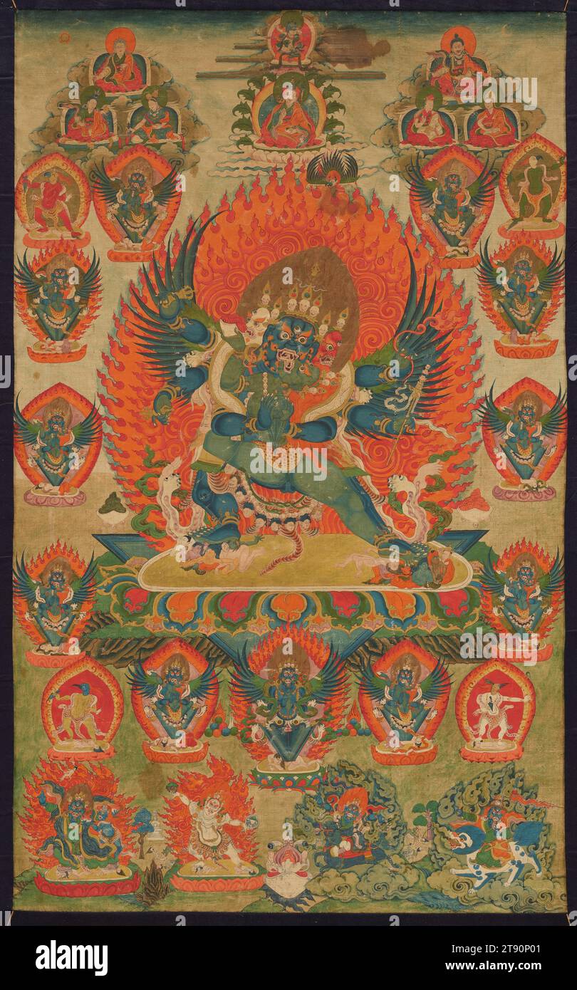 Thangka of Vajrakila and Diptachakra, late 19th century, 33 3/8 x 20 7/16 in. (84.77 x 51.91 cm) (image), Ink colors and gold on sized cotton, Tibet, 19th century, In Tibetan Buddhist practice, buddhas and bodhisattvas can express both benevolent and wrathful sides. Vajrakila is a wrathful form of the Cosmic Buddha Vajrasattva, a purifying force who valiantly tramples obstacles on the path to enlightenment. Vajrakila is shown in the center, in union with the female deity Diptachakra, who represents wisdom. The focal meditational deity is surrounded by 10 miniature Vajrakila images Stock Photo