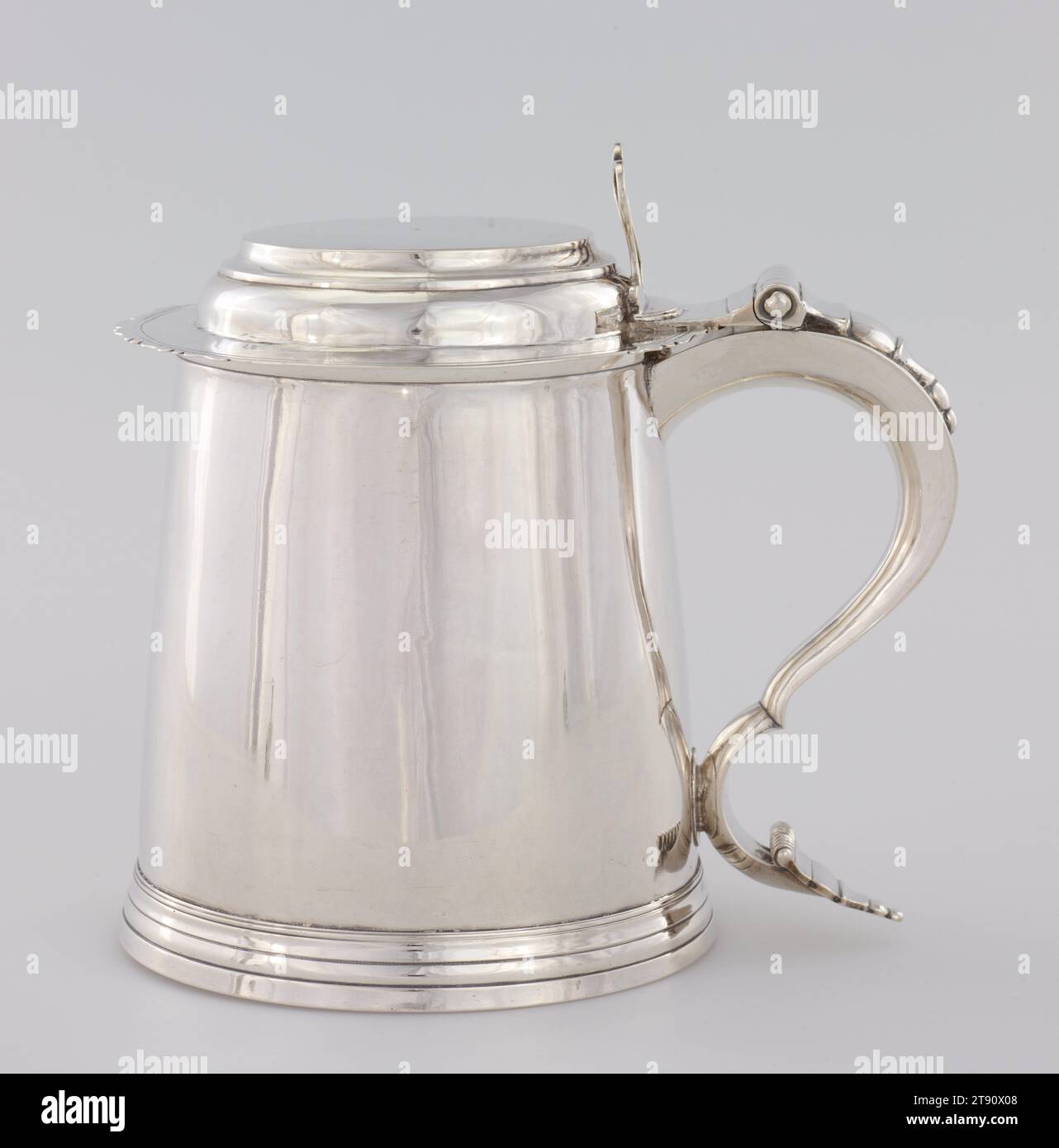 Tankard, about 1760-1770, Unknown New York, American, 1767 - 1792, 8 x 7 3/4 x 5 1/2 in. (20.32 x 19.69 x 13.97 cm), Silver, United States, On the underside of the base of this tankard is an inscription that reads, 'THE GIFT OF Mr. JOSEPH MARVIN, TO JANE LORD, HIS GRAND DAUGHTER 1790.' The tankard subsequently descended through the Noyes family of Old Lyme, Connecticut, and eventually came to Minnesota with Edwin Noyes Dodge in 1865. Mr. Dodge, a farmer, served as a state senator from Dodge County, Minnesota from 1887 to 1889 Stock Photo