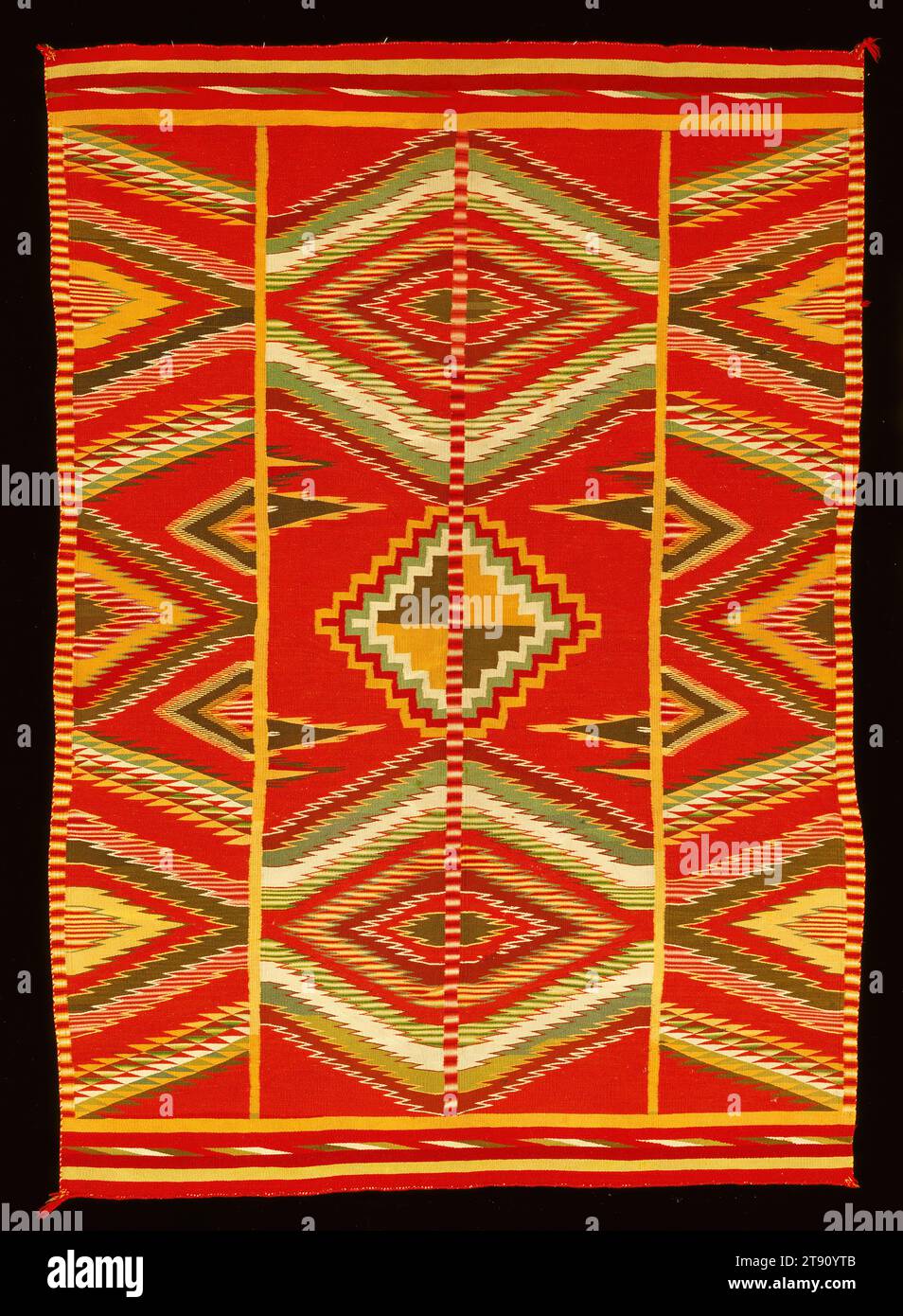 Eye-dazzler' Blanket, c. 1890-1895, 76 x 53 in. (193.0 x 134.6 cm), Wool; tapestry structure, United States, 19th-20th century, In the mid to late 1800s, brilliantly colored woolen yarns arrived in the Southwest from mills in the East, primarily Germantown, Pennsylvania. With this new color palette augmenting the natural dyes gathered from local sources, Navajo weavers created intricate and bold textile designs, pushing the boundaries of color and form while maintaining the distinctive Navajo aesthetic and concept of hózhó, which encompasses beauty, balance, grace, symmetry, and harmony Stock Photo