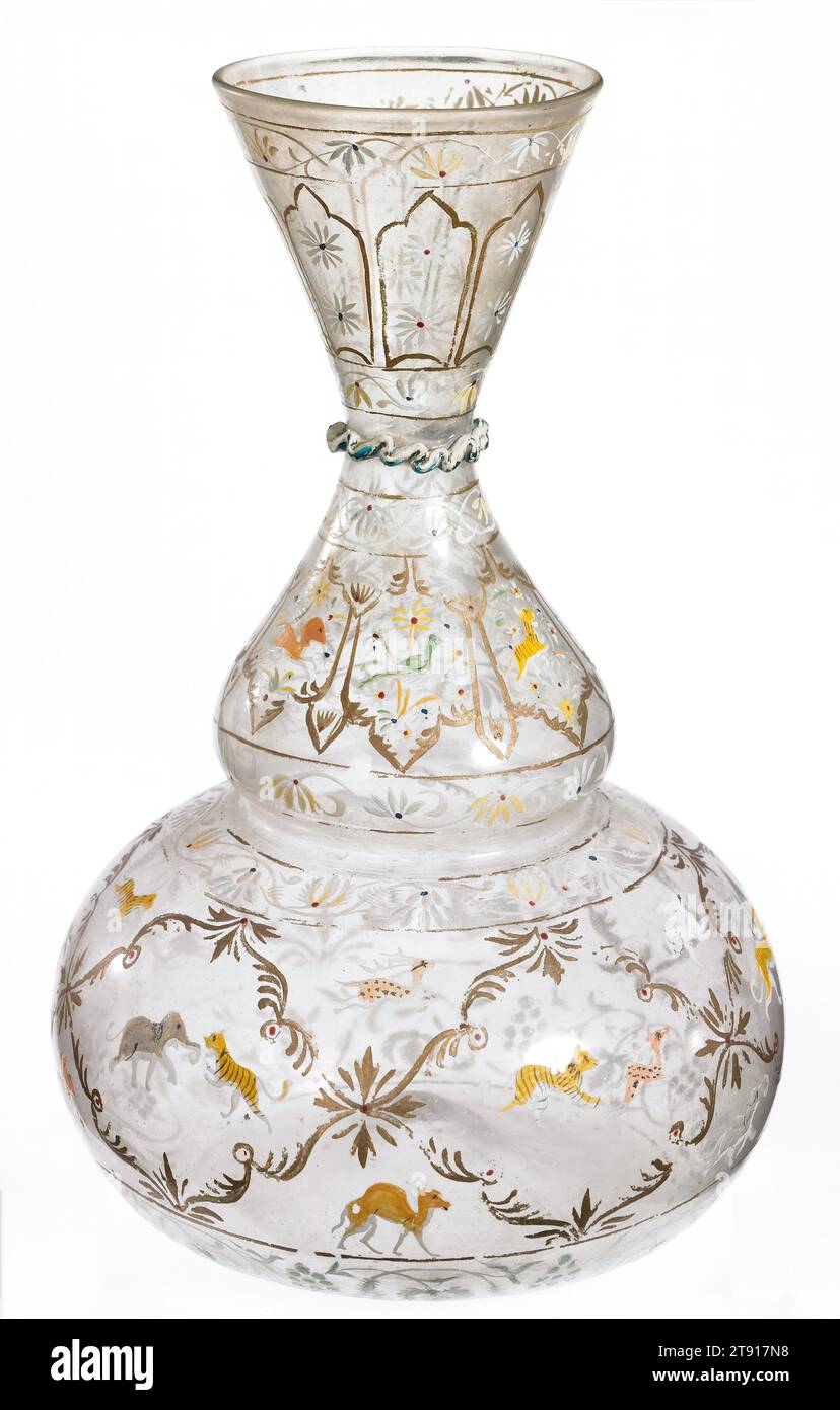 Glass vase with animal painting for Indian market, 1670-1700, 10 x 6 1/2 in. (25.4 x 16.51 cm), Colorless glass with enamel decor, India, 17th-18th century, Venice was the leading center of the international glass trade during the 1400s and 1500s. Muslim traders imported European glassware to India throughout the 1600s. This distinctively shaped vase, made of clear Venetian glass with enameled decoration applied in India, was probably executed for one of the Islamic courts of the Deccan region Stock Photo