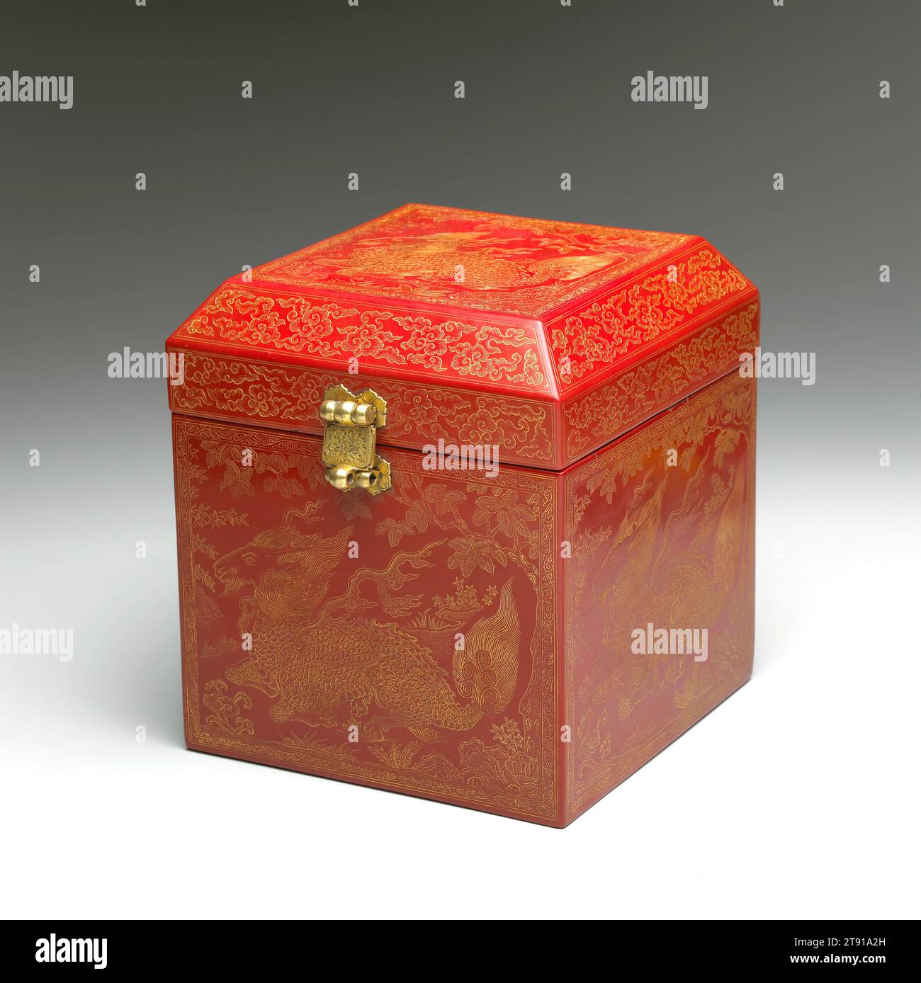Seal Box, c. 1410, 8 5/8 x 7 3/4 x 7 3/4 in. (21.9 x 19.7 x 19.7 cm), Red lacquer with engraved gold decoration (qiangjin), China, 15th century, Made in the imperial Chinese workshops, large, elaborate seals presented in luxurious boxes were among the gifts bestowed on a number of Tibetan dignitaries who traveled to China’s capital for audiences with the Xuande (r. 1426-35) and Yongle (r. 1403-24) emperors. This presentation box is one of the few known to have survived to the present day, and was possibly given to a Tibetan hierarch in the early 1400s. Stock Photo