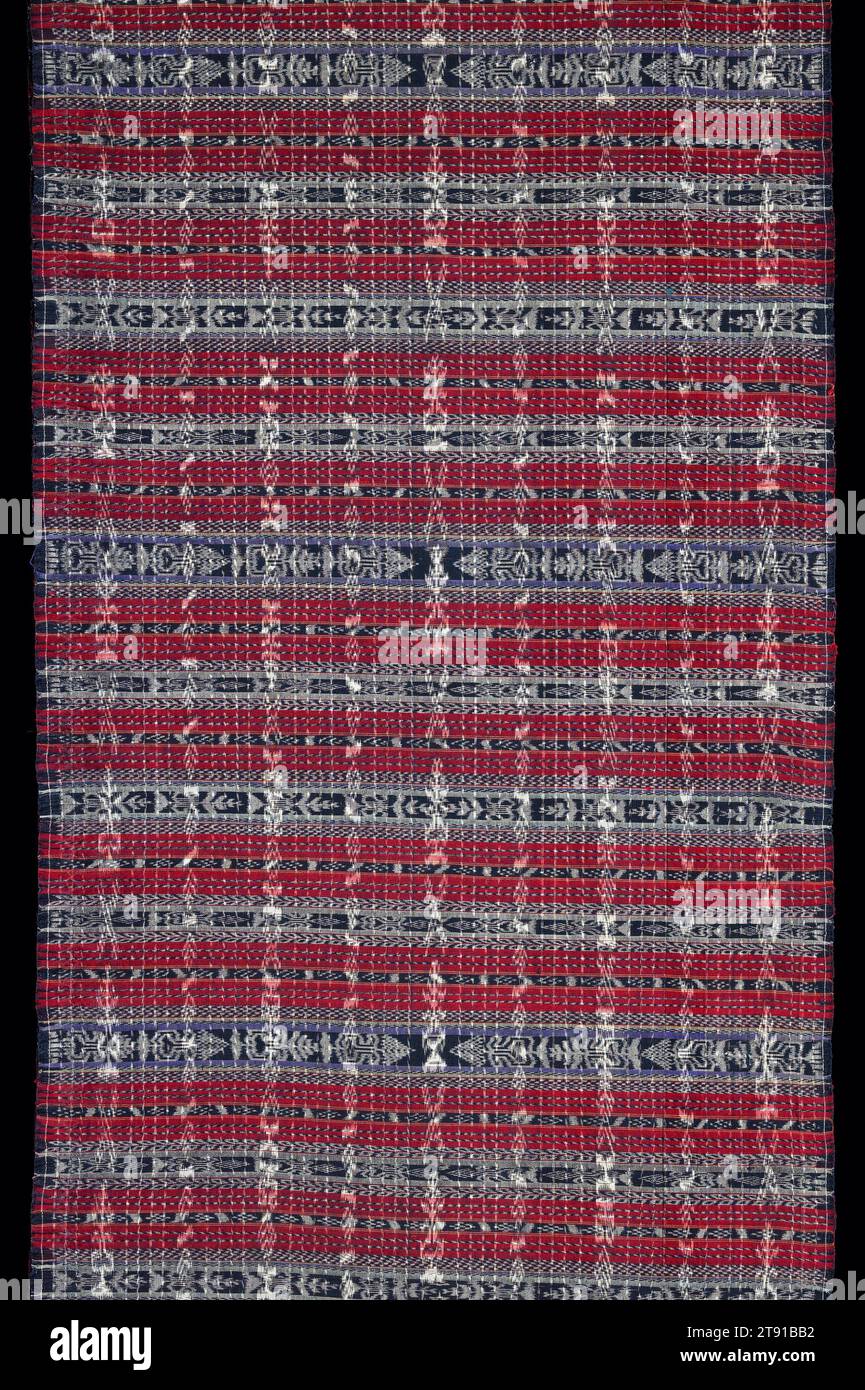 Woman's wedding or ceremonial skirt (corte), early 20th century, 230 x 36 1/2 in. (584.2 x 92.7 cm), Silk, cotton; warp and weft ikat, Guatemala, 20th century, Double jaspe, in which both the warp and weft contain bands of jaspe figures, produces a dizzying juxtaposition of patterns that greatly tests the weaver's skill. In all ikat, precise alignment of the threads is essential to producing a sharply defined pattern area. Many weavers employ specialists who align the jaspe warp threads before weaving commences. The weaver alone can make adjustments in the weft patterns Stock Photo