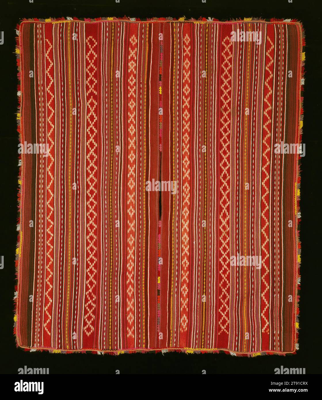 Poncho (Punchu), 20th century, 64 x 56 in. (162.56 x 142.24 cm) (including fringe), Wool ikat, Bolivia, 20th century, Since the Spanish conquest, sheep’s wool has joined alpaca, llama, and vicuña wool as a preferred fiber for weaving. Today, machine-spun yarn has become a symbol of status, but many garments are still made of hand-spun wool. The traditional spinning process takes part in three stages. The raw wool is first spun into a fine strand, and then spun again to create two plies. After it is dyed, it is re-spun very tightly, into what is called a 'crepe twist.' Stock Photo